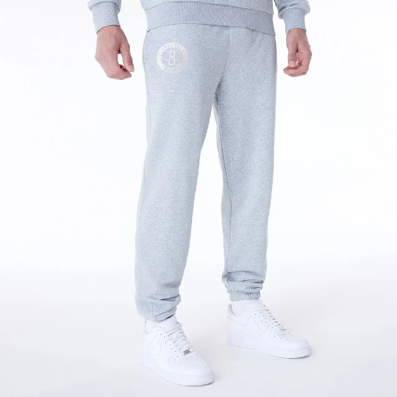Men's Drawstring Pants for AdjustabilityBrooklyn Nets NBA League Essential Grey Fleece Joggers Men's Drawstring Pants for AdjustabilityBrooklyn Nets NBA League Essential Grey Fleece Joggers