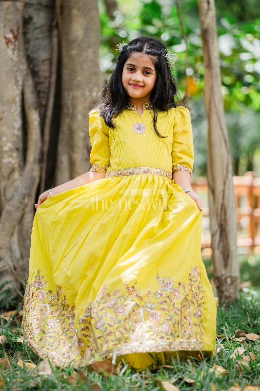 Tea-Length DressGirls Party Gown in Mustard Tissue Silk with Puff Sleeves and Floral Embroidery Tea-Length DressGirls Party Gown in Mustard Tissue Silk with Puff Sleeves and Floral Embroidery
