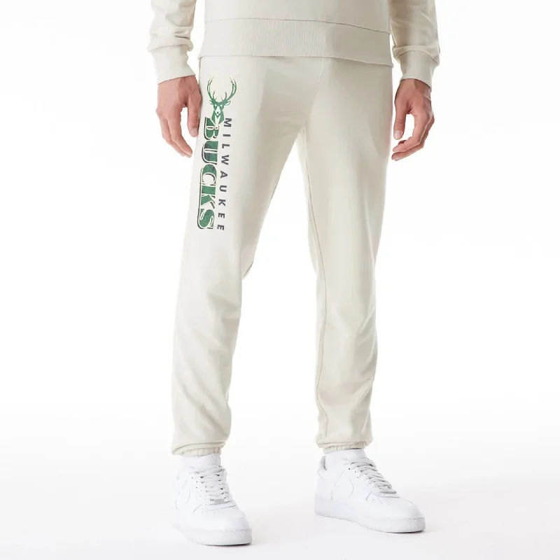Men's Relaxed-Fit Pants for ComfortMilwaukee Bucks NBA Graphic Cream Joggers